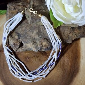 Multi-Strand Necklace With Blue And White Glass Beads and Gold Toned Accents